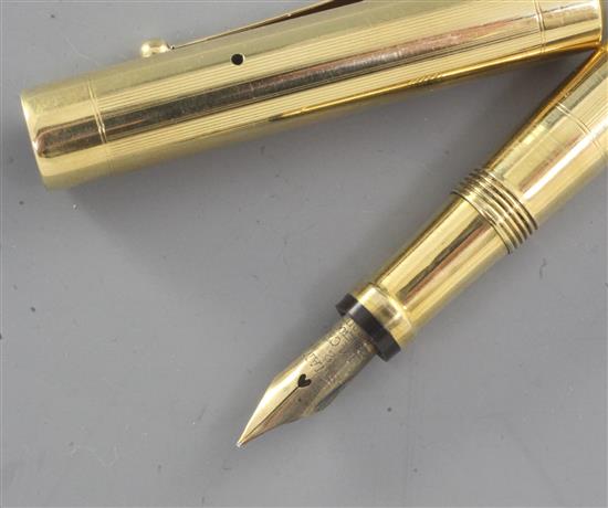 A 1930s 18ct gold cased Swan fountain pen, 13.4cm.